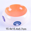 Tazón interior Naranja Tazón exterior Estilo de tambor blanco Huellas impresas Alimentador de cerámica para mascotas Tazón de cerámica para perros